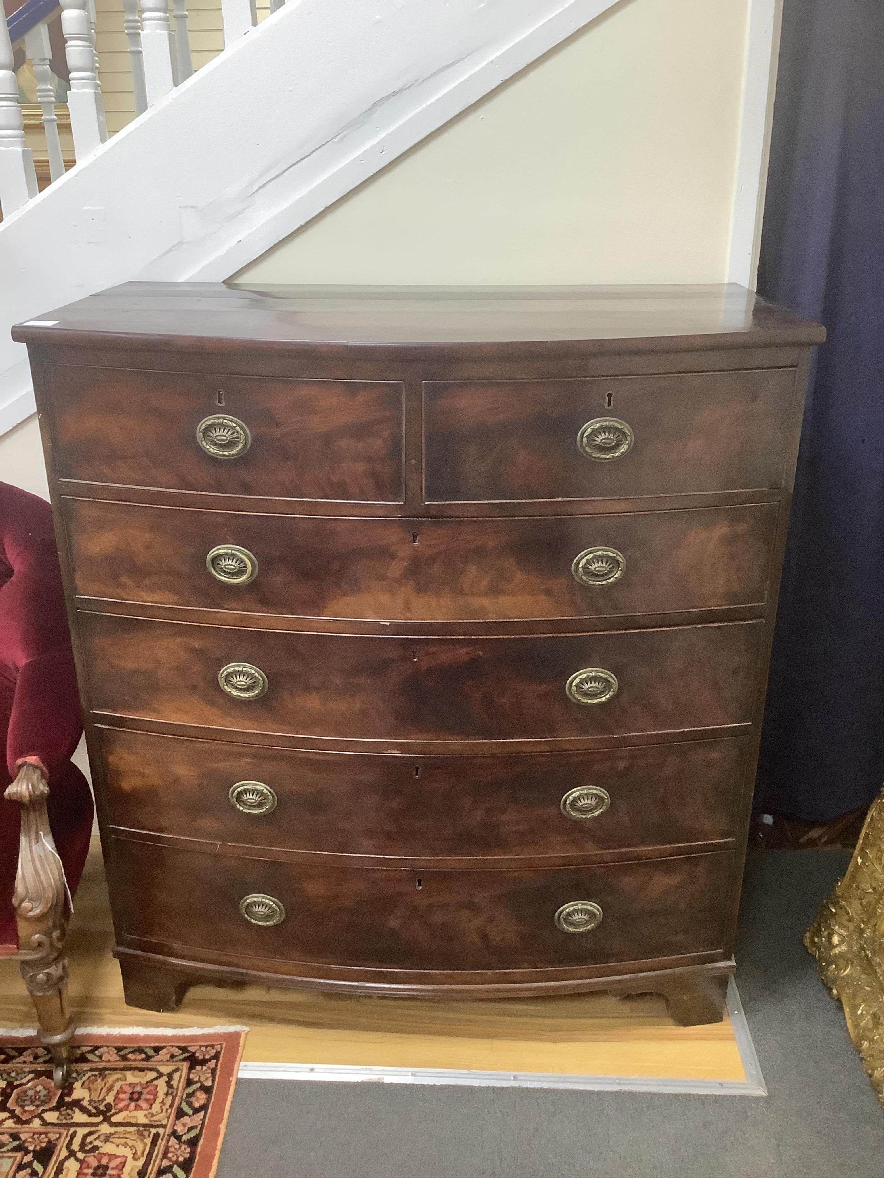 A Regency mahogany bowfront chest, width 107cm, depth 58cm, height 118cm. Condition - fair